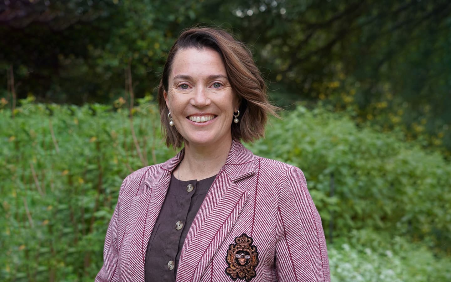 Photo of Julia Ladgrove in front of Ormond gardens.